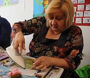 Zdena Pisker demonstrating the encaustic painting technique
